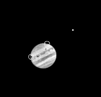 3 moon shadows on Jupiter